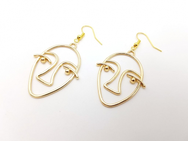 Gesichts Ohrringe goldfarben